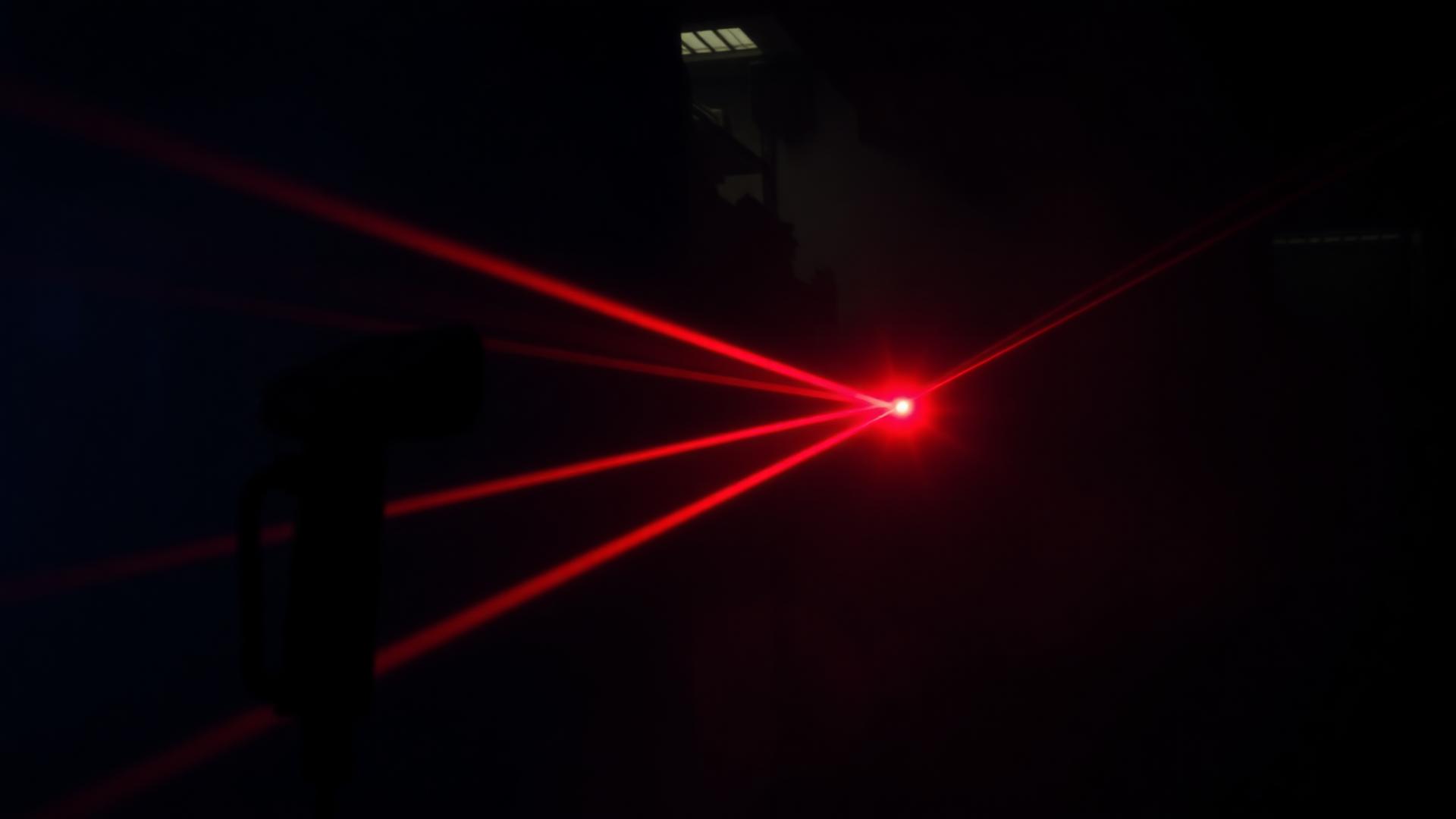 Red barcode scanner laser beams illuminating a warehouse aisle during the mail-in repair process